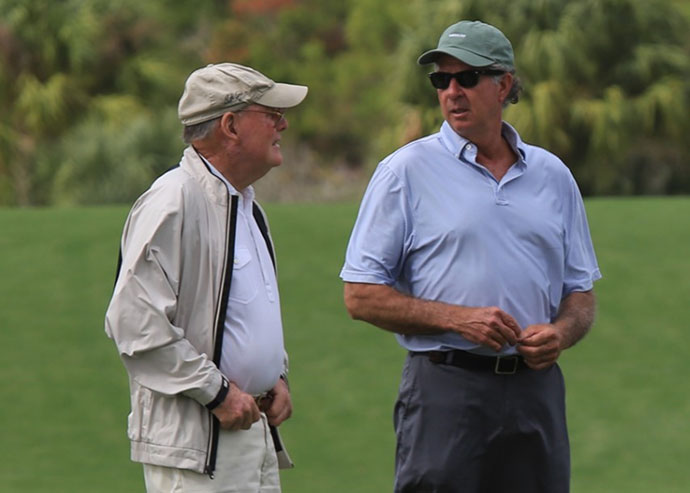 Bobby Weed standing with Pete Dye on a golf course