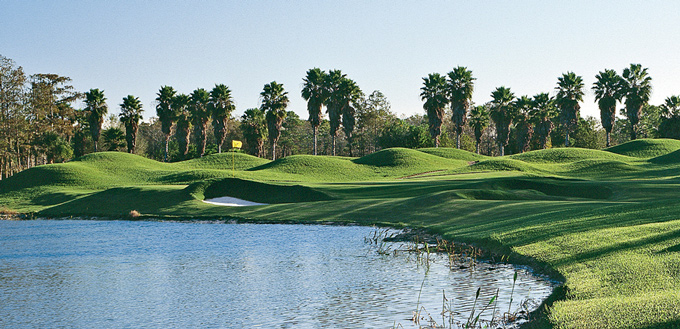Hole 8, cypress hammock on right, water and bunkers guard the green on the left, The Dye Preserve Golf Club, Jupiter, FL, Pete Dye and Bobby Weed