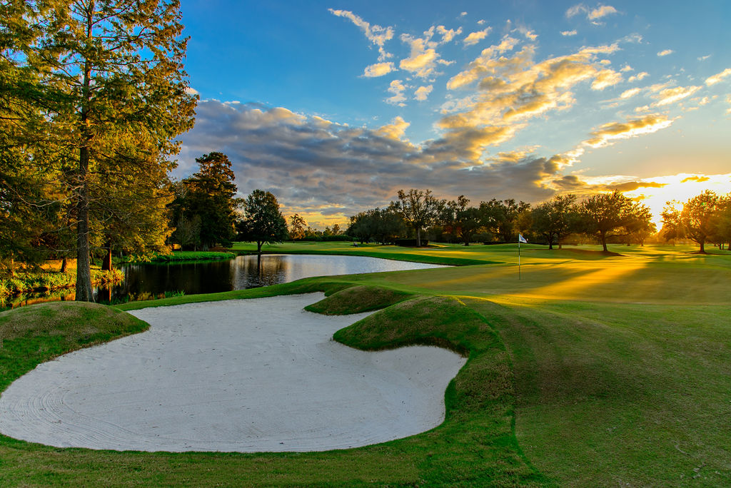 The par five ninth hole at New Orleans Country Club’s at sunset.